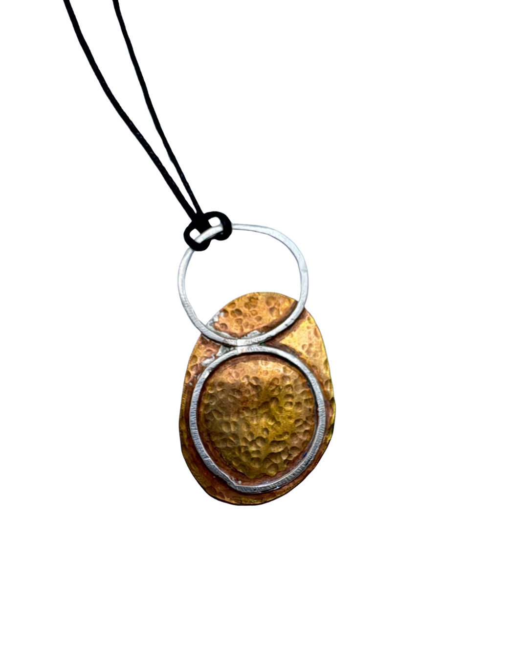 Oxidised silver and brass pendant on black string