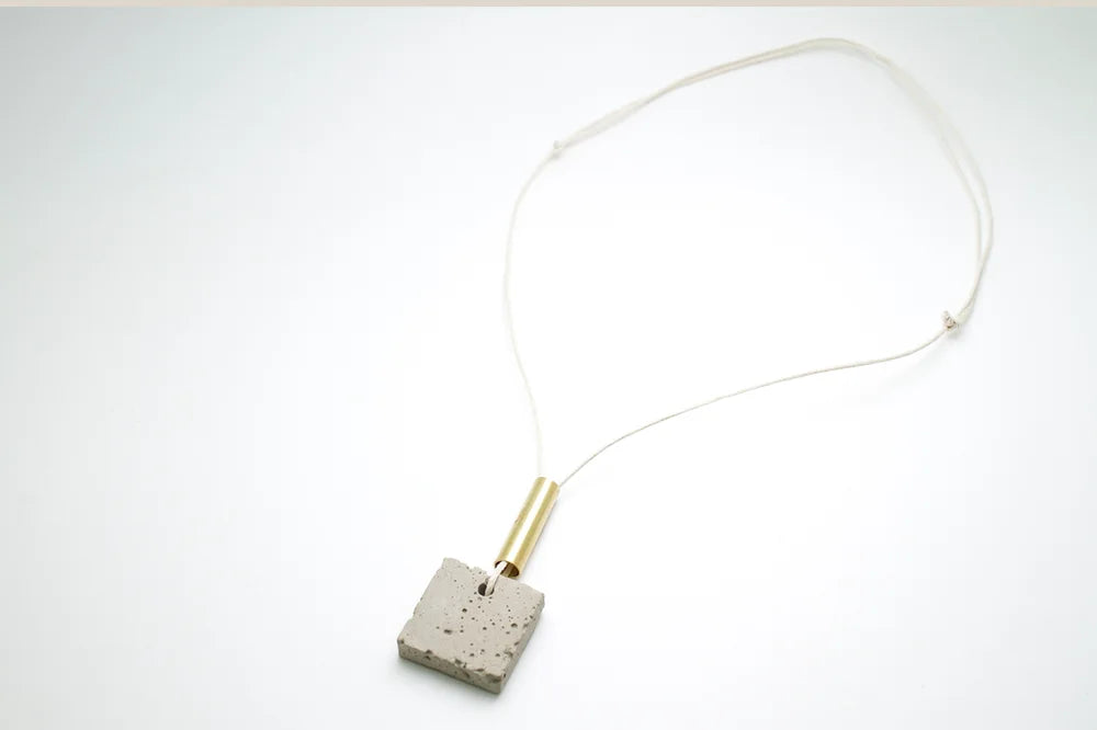 Square Concrete Pendant with Brass tube on white Cord